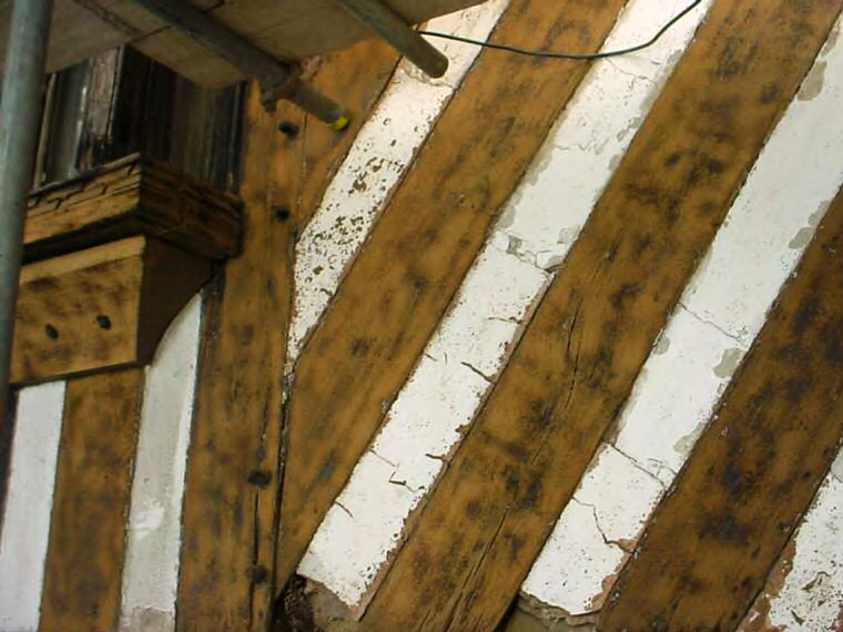 Building restoration paint removal from beams